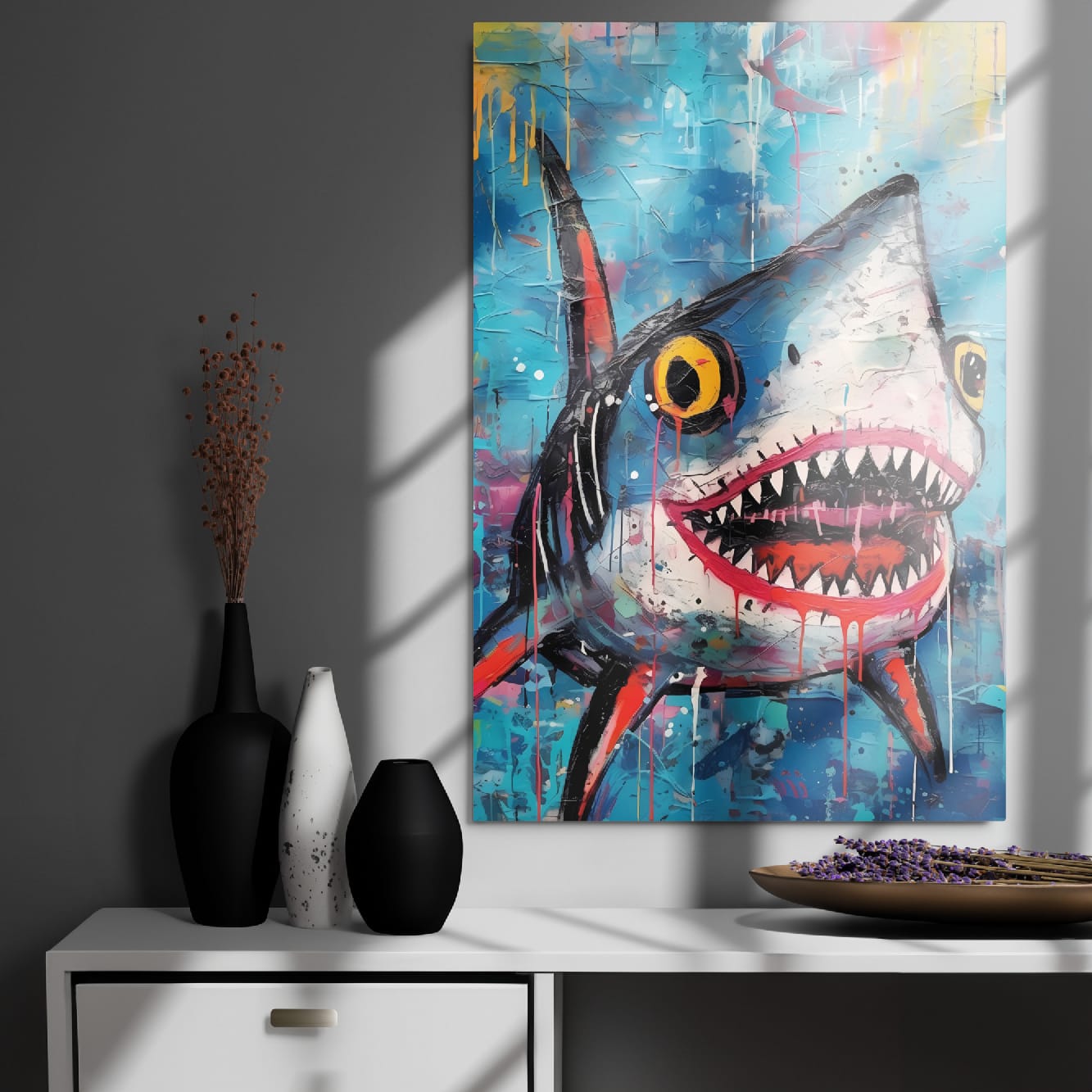 "Neon Predator" glossy metal poster 24"x36" on modern gray wall above console decor with window-light shadows, bold graffiti shark metal print featuring open jaws, jagged teeth, yellow eyes, and dripping paint accents, by GiveMeMood